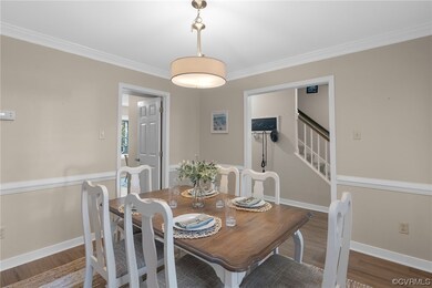 Dining area featuring dark hardwood / wood-style f