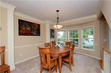 Dining room with view of the quiet cul de sac lot.