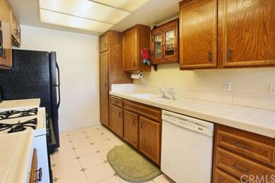 Another view of kitchen, lots of storage including