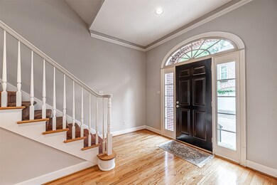 Home entry opens to staircase and has hardwood flo