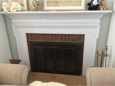 Living Room. Wood burning fireplace.