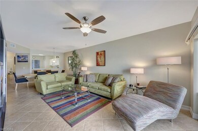 Living room featuring light tile patterned floors 