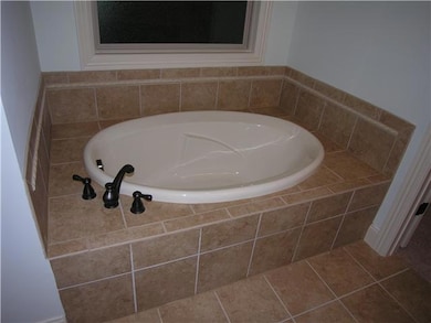 Tile tub surround & shower walls, in the master bath. It's the Barlow Difference!