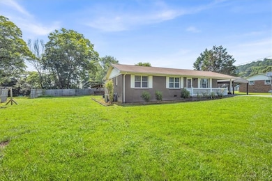 View of front of property featuring driveway