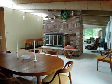 Dining Room. The view of the double sided fireplac