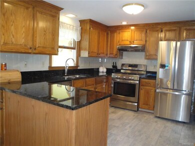 Stunning Granite Counters, Tile Floor and Stainles