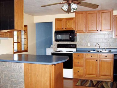 Kitchen.         from kitchen goes into laundry ro