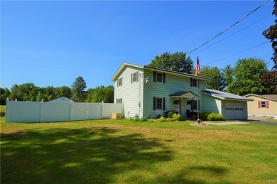 Gorgeous fully fenced yard offers privacy and conv