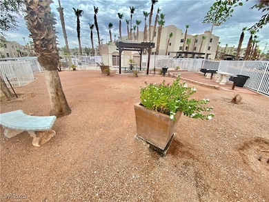 View of home's community featuring fence