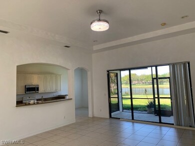 Unfurnished living room with light tile patterned