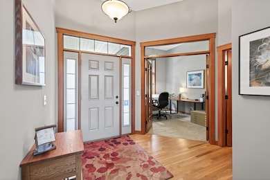 Front entryway loaded with light and transoms