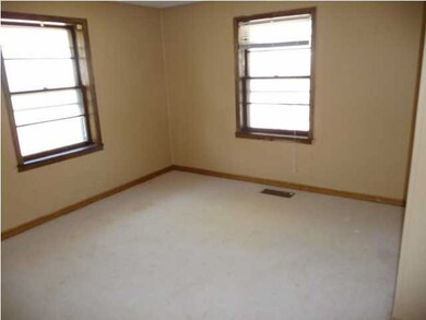 One of three main floor bedrooms.