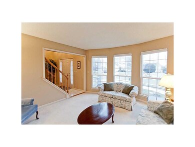 Living Room. Bright living room with bay windows