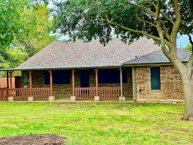 Large fenced back yard with covered porch