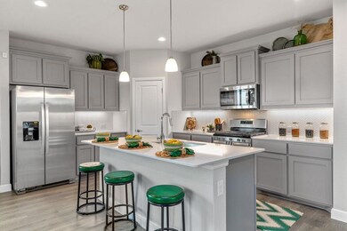 Photos shown here may not depict the specified home & features included are for illustration purposes only