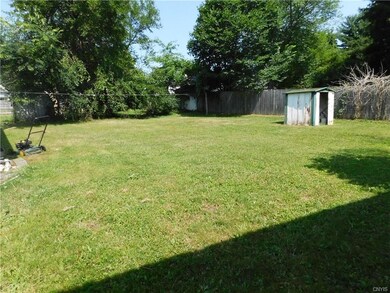 BACK YARD WITH SHED THAT CAN LEAVE OR TAKE OUT