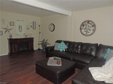 Large spacious living room open to dining area