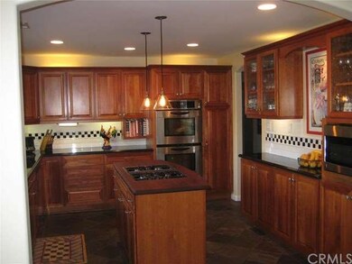 Jen Air appliances, beautiful cabinets, stone floo