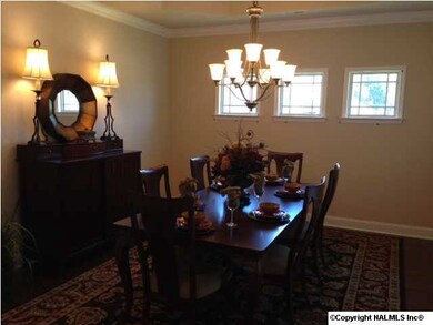 Flex room at front of house can be used as formal dining, study or another sitting area