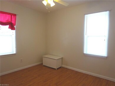 Bedroom Three: Located on the first floor