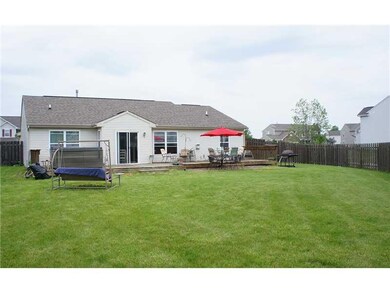 Exterior Back. Large fully fenced backyard.