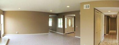 Pano View looking from living room towards front d
