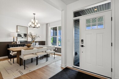 (Photo of a decorated model, actual finishes will vary)  Located just off the foyer, this main level flex room provides endless opportunities; including a home office, formal dining area, an extra playroom or another sitting room.