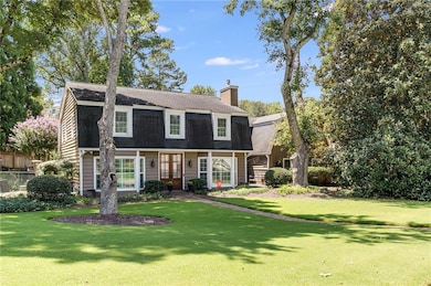 A charming home with curb appeal that instantly impresses.