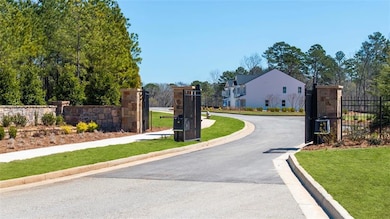 View of road with a gate and curbs