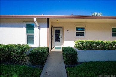 Level Entry to your ONE LEVEL Spacious Condo.  New Roof, Hurricane/Impact Windows (except in Florida Room), Washer and Dryer in Condo, Updated Appliances and A/C - LOW CONDO Fees!!