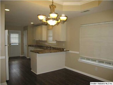 View from the Formal Dining Room into the Kitchen.