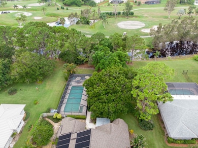 Aerial showing rear yard and Creak/Pond in Rear