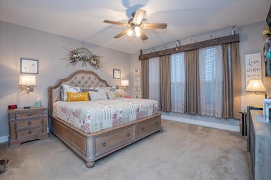 Large primary suite with natural light.