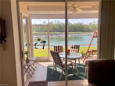 Sunroom /  featuring a water view , sunsets, remot
