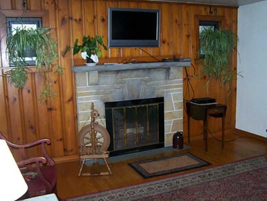 Living Room. LOG BURNING FIREPLACE WITH STONE FIRE