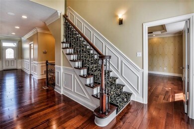 Greet guests into the foyer with extensive casemen