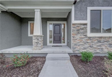 ENTRANCE & FRONT PORCH - NOTICE STONEWORK