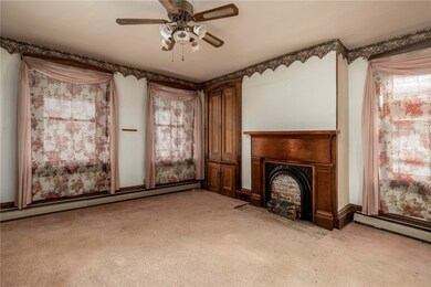 The living room features a large built-in.   Great