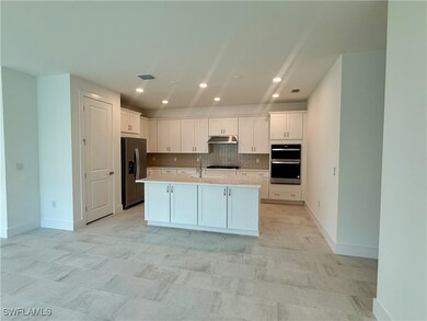 Kitchen layout with alternate kitchen island, stai