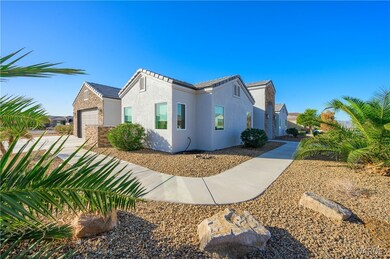 View of property exterior featuring a garage, ston