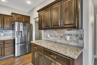 Granite Counters and Tile Backsplash