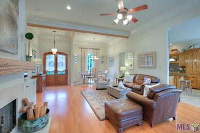 Wood beams, wood fireplace mantel and cypress kitc