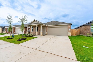 View of front of property featuring an attached g