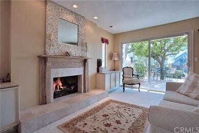 This inviting living room with gas or wood firepla