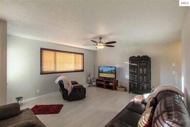 Appealing living room with outdoor access to hot t
