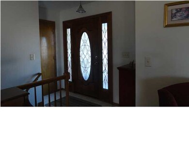 Foyer entrance with leaded glass door!