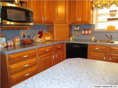 Kitchen with numerous cabinets.