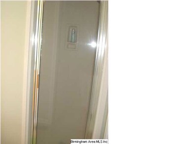 A separate shower and a garden tub await your rela