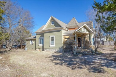 FRONT AND WEST SIDE OF HOME