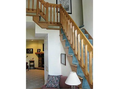 Entry/Foyer. Beautiful wood staircase in foyer.